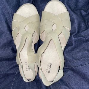 Bone colored sandals with platform soles
